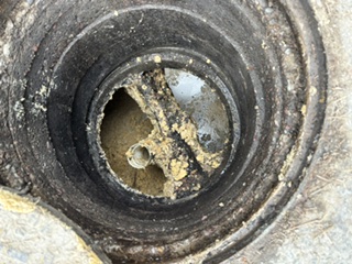 Grease buildup inside a drain line