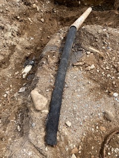 Old sewer pipe dug up from the ground